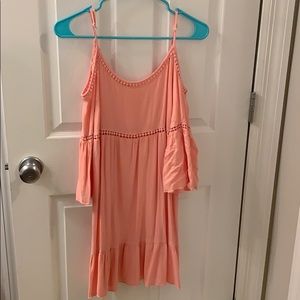 Dress with long sleeves and shoulder cut out